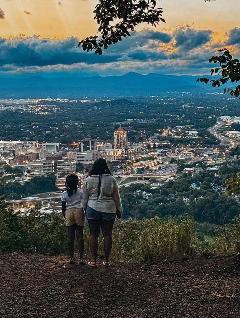 standing next to city of roanoke